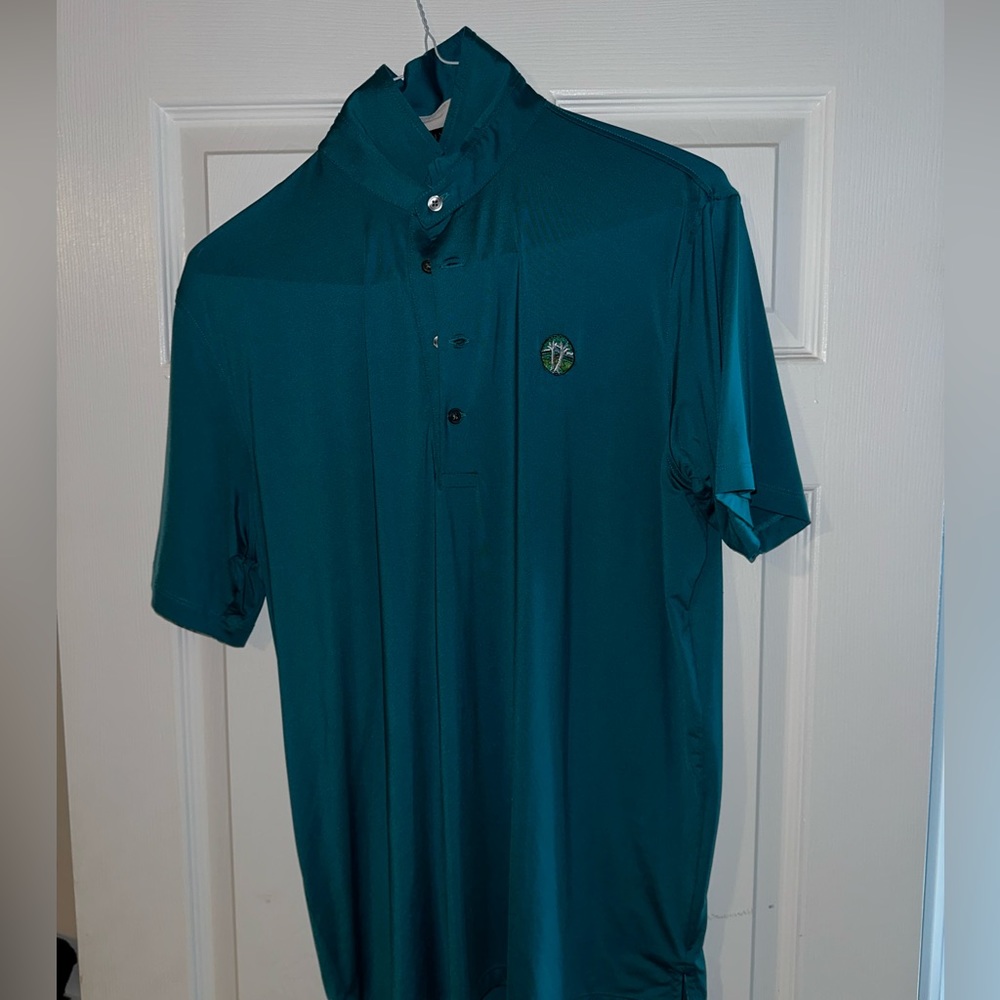 Greyson mens medium teal with a white spot on back near inside shoulder blade